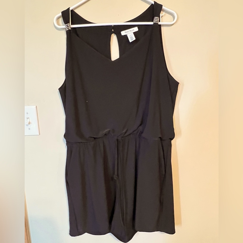 Black short jumpsuit from White House Black Market.